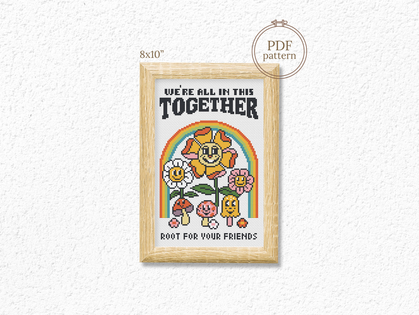 Cartoon-style cross stitch pattern with phrase "We All In This Together", modern colorful trendy design