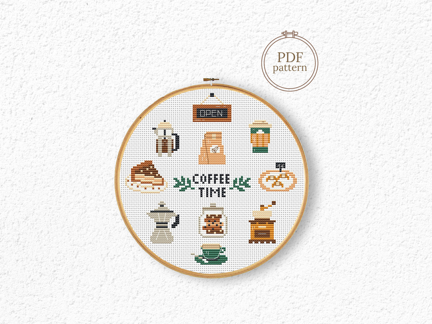 Coffee Time cross stitch pattern with coffee cups, beans, mugs, and cozy coffee-themed elements
