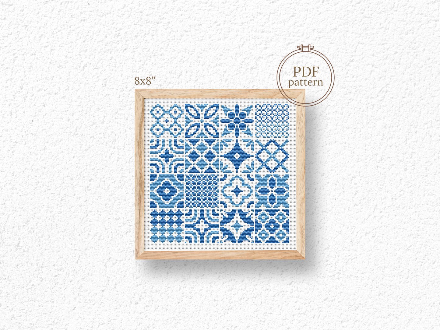 Blue tile style cross stitch pattern with intricate ceramic-inspired design