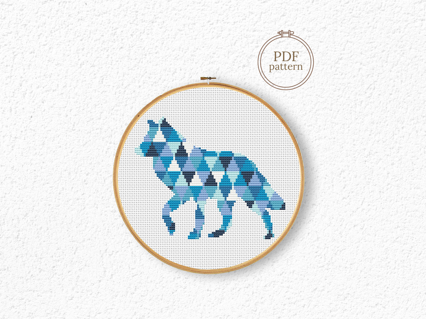 Geometric wolf cross stitch pattern in triangle shapes, modern wildlife PDF embroidery design