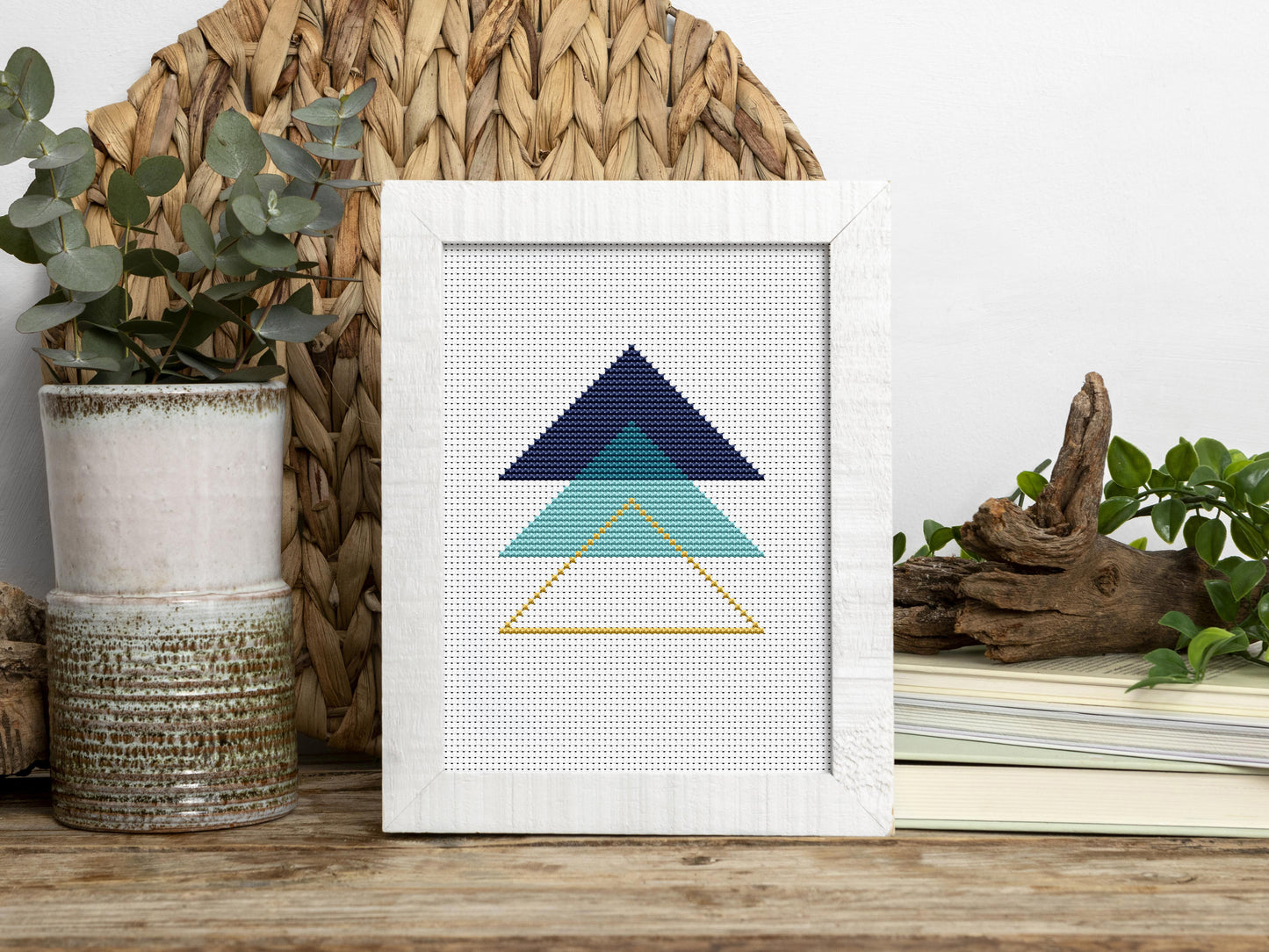 Triangle blue abstract cross stitch pattern with modern geometric design