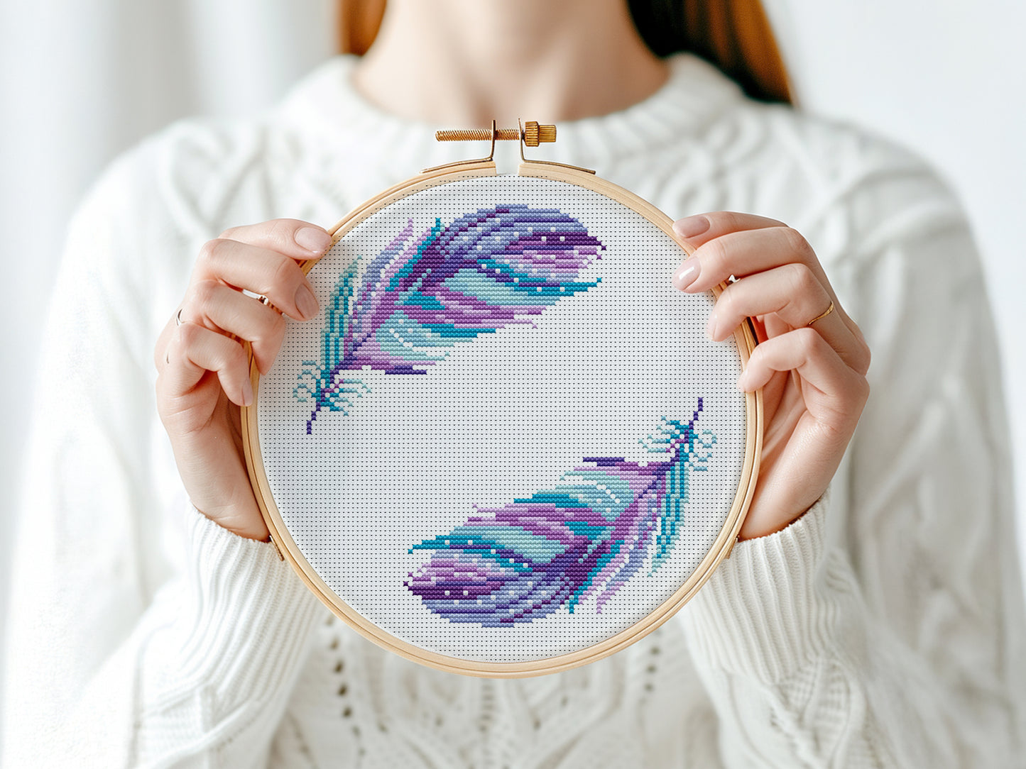 Boho cross stitch pattern with colorful feathers in free-spirited bohemian style