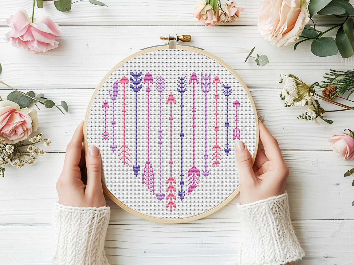 Free arrows in heart shape cross stitch pattern – minimalist modern embroidery PDF design for Valentine’s or love-themed projects