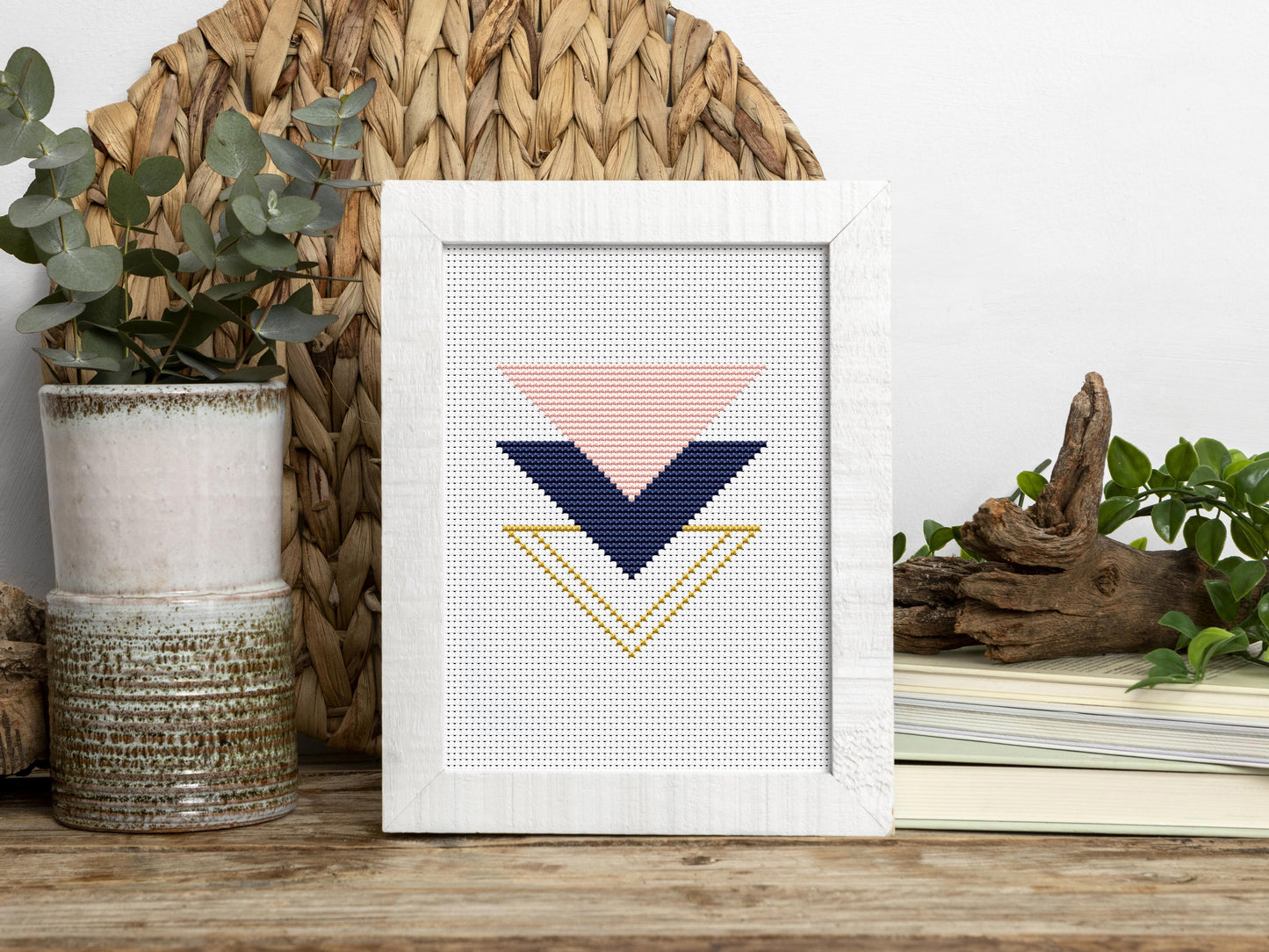 Triangle rose and gold cross stitch pattern with geometric and floral design