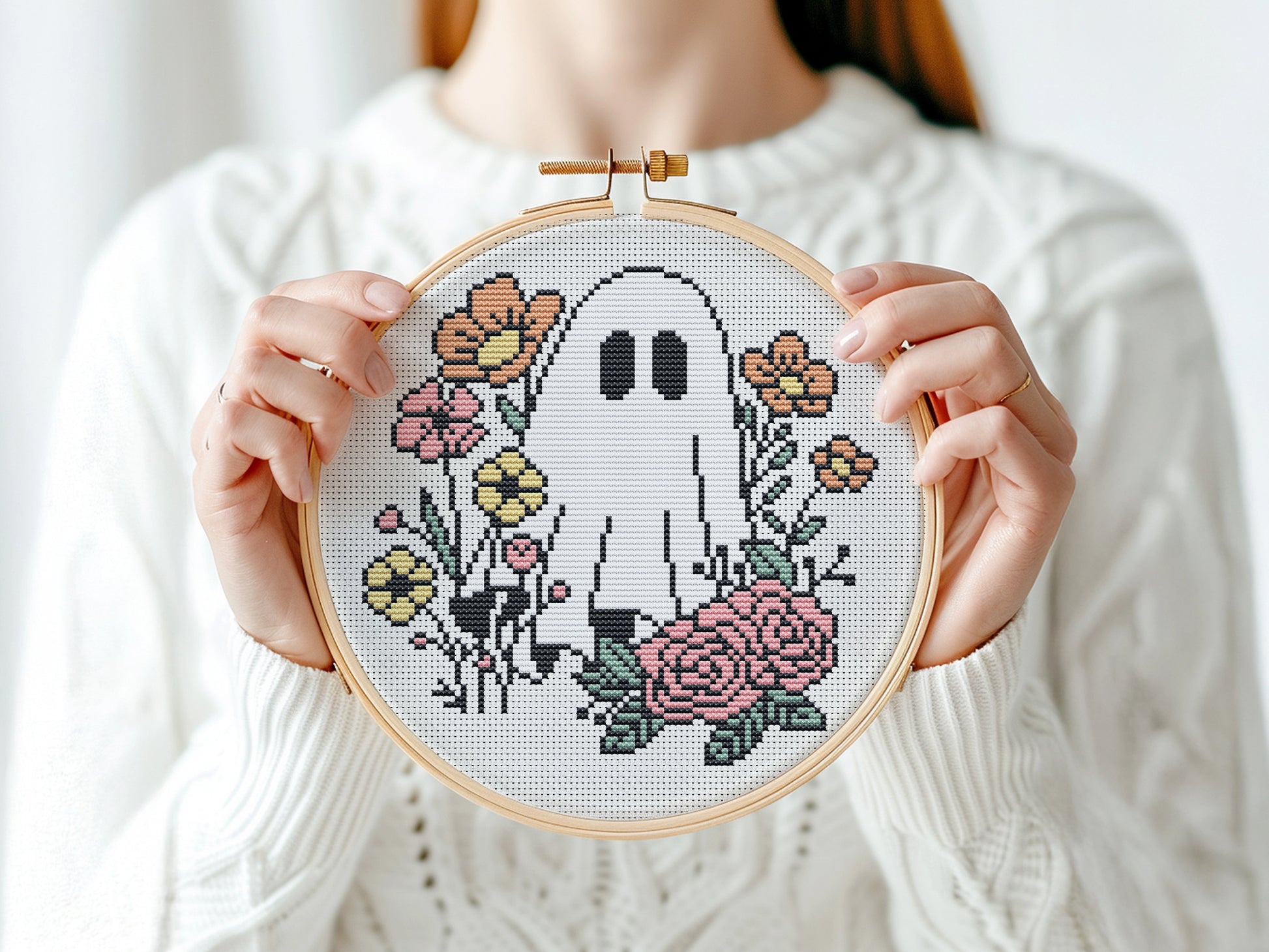 Halloween cross stitch pattern with ghost Jack and flowers
