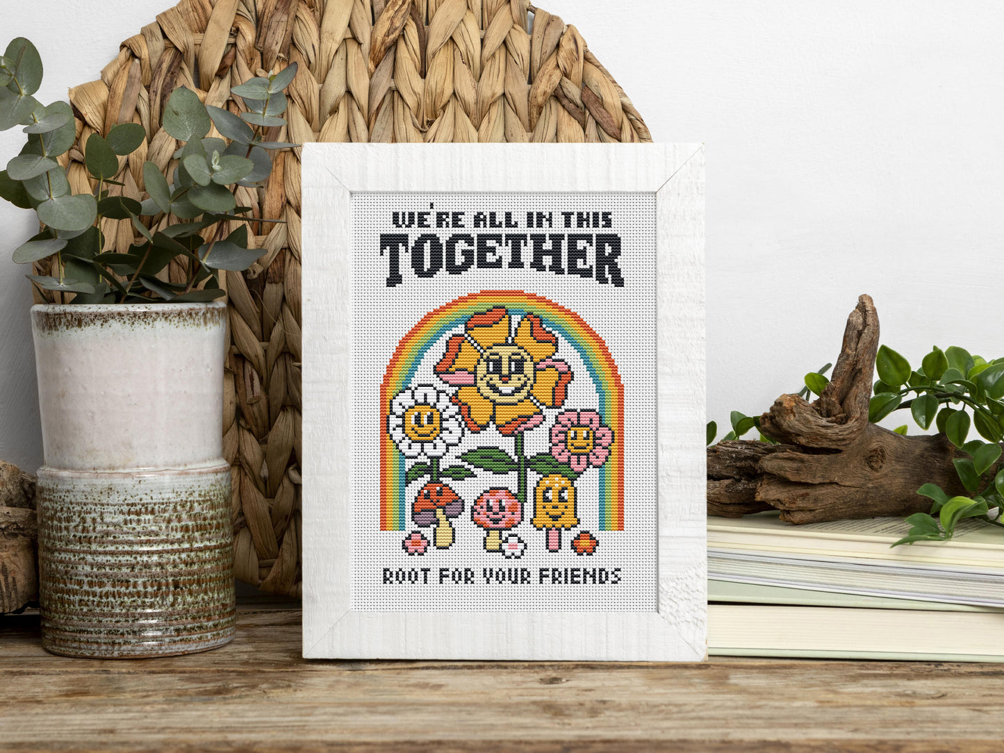 Cartoon-style cross stitch pattern with phrase "We All In This Together", modern colorful trendy design
