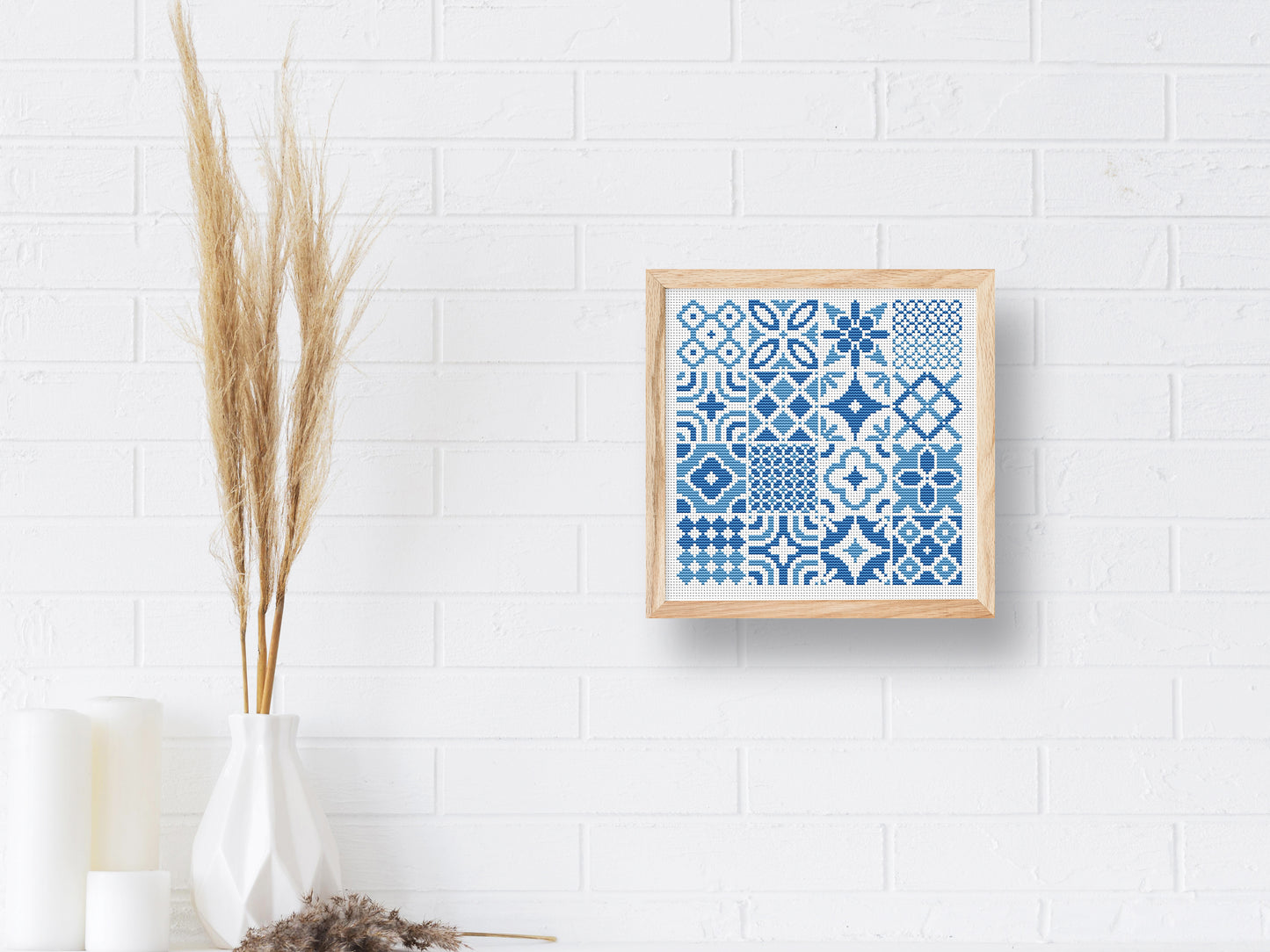 Blue tile style cross stitch pattern with intricate ceramic-inspired design