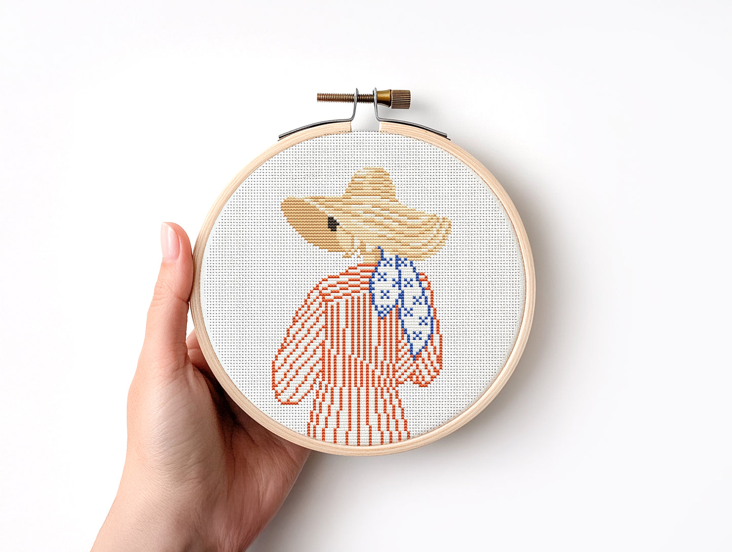 Cross stitch pattern of a woman in a hat looking at the ocean, minimalist summer beach PDF design