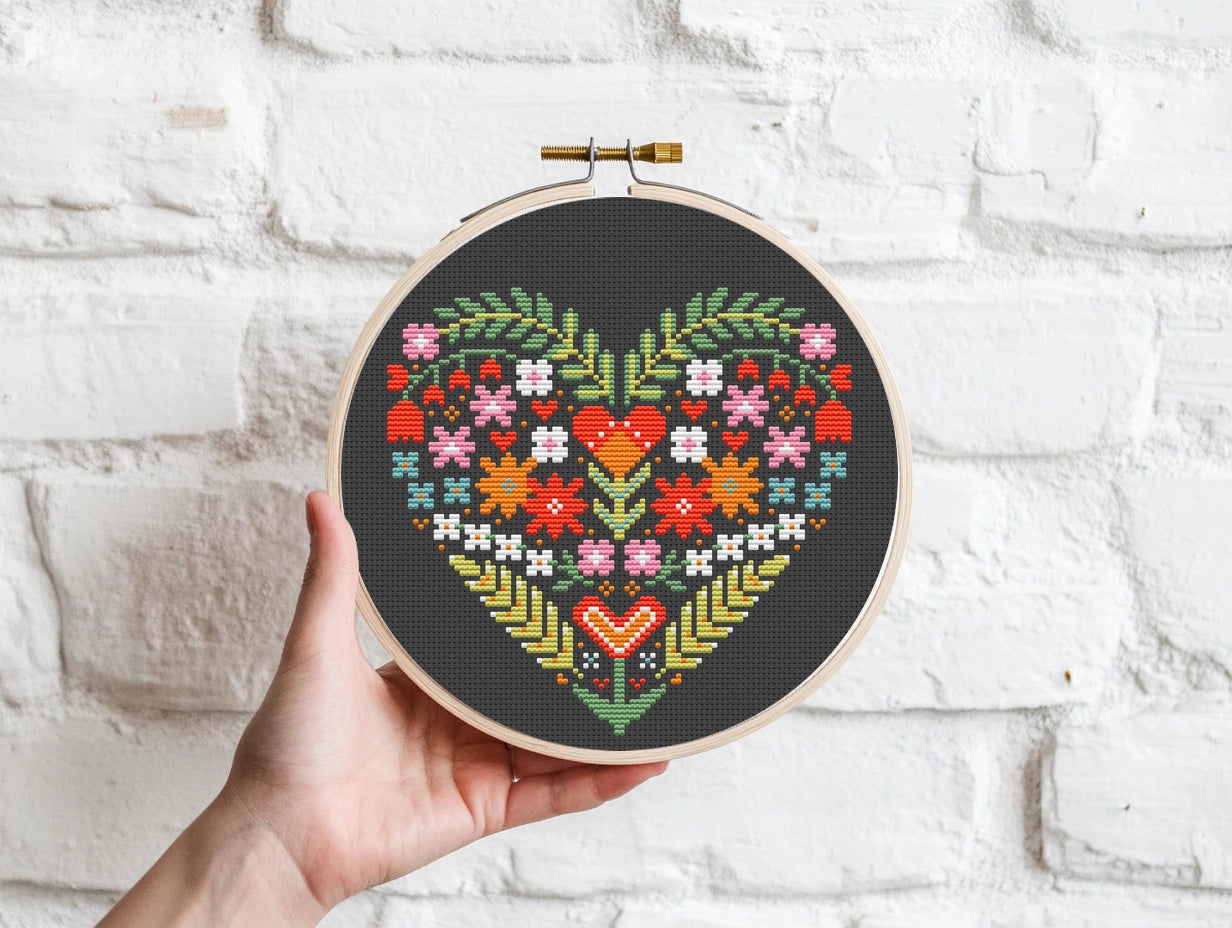 Folk Floral heart cross stitch pattern on black Aida fabric