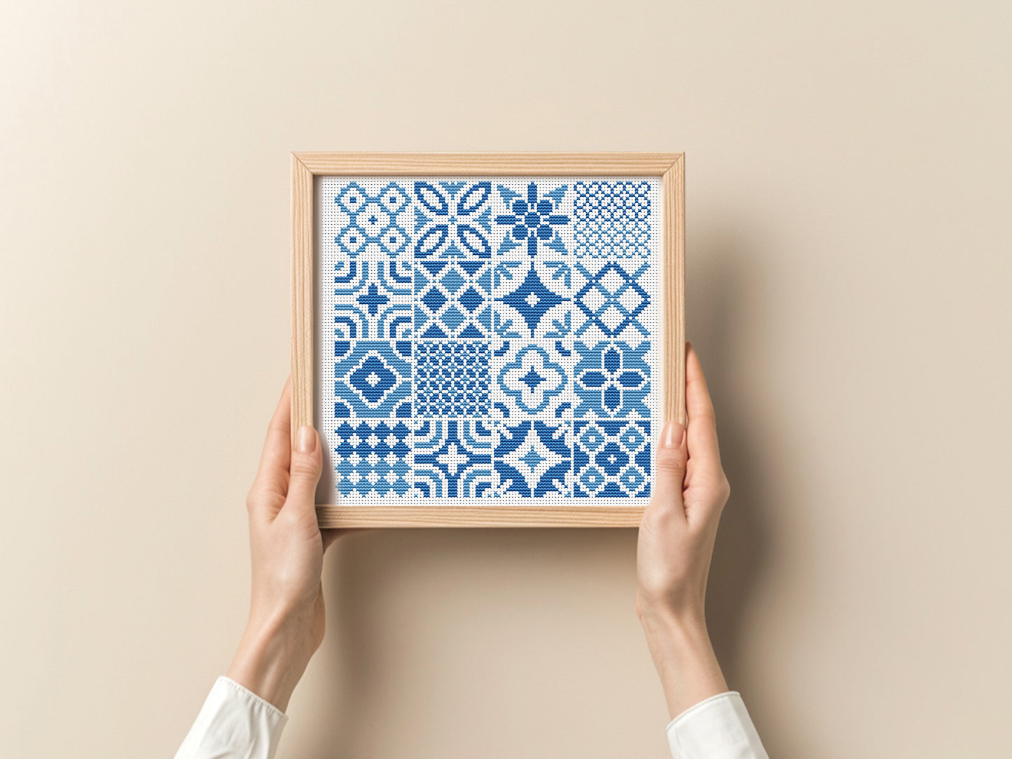 Blue tile style cross stitch pattern with intricate ceramic-inspired design
