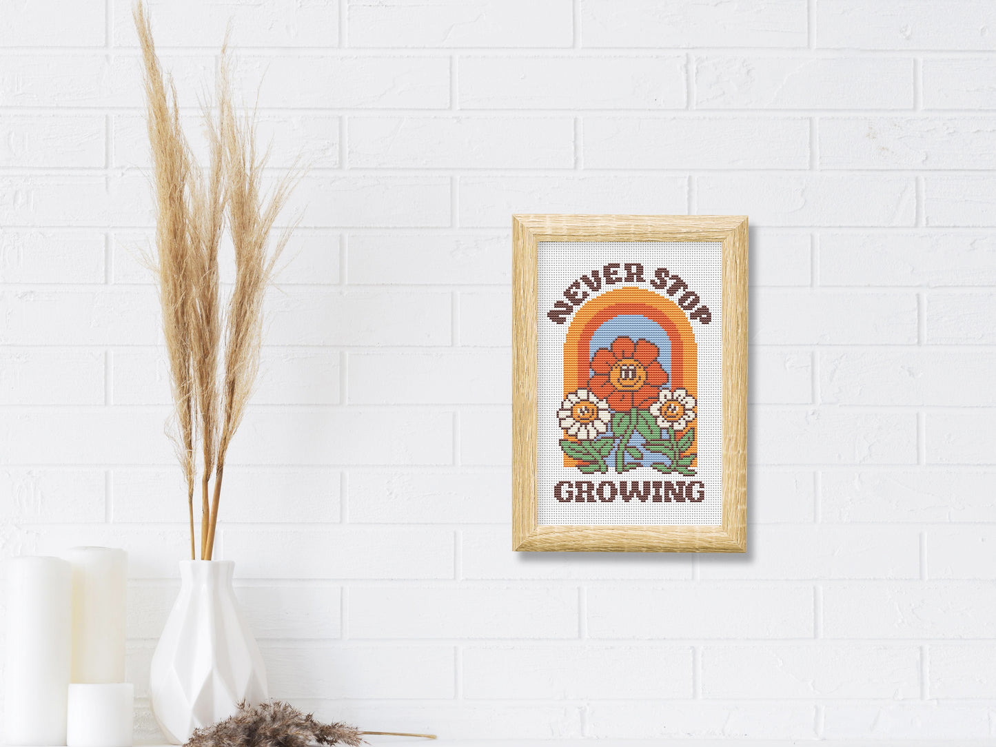 Never Stop Growing cartoon quote cross stitch pattern with retro colors – PDF download.