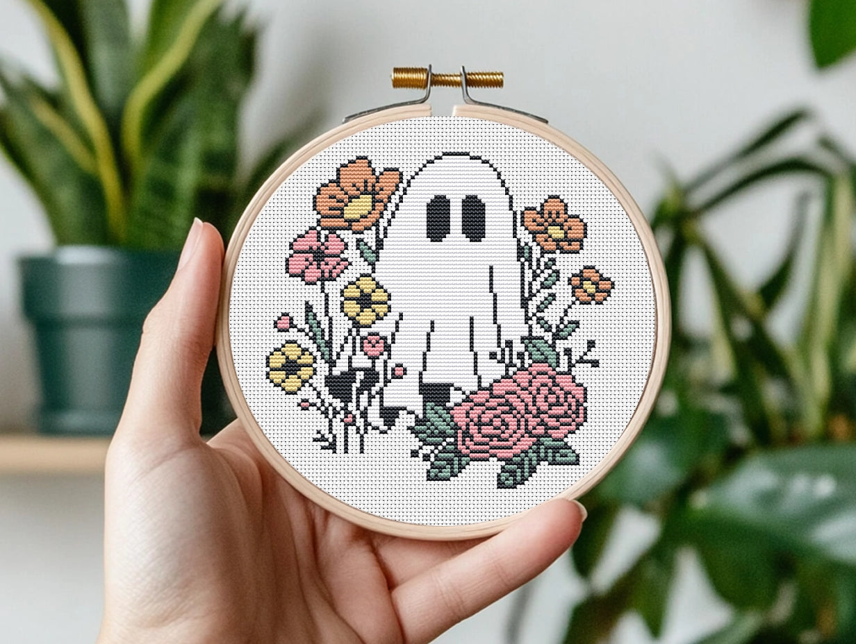 Halloween cross stitch pattern with ghost Jack and flowers
