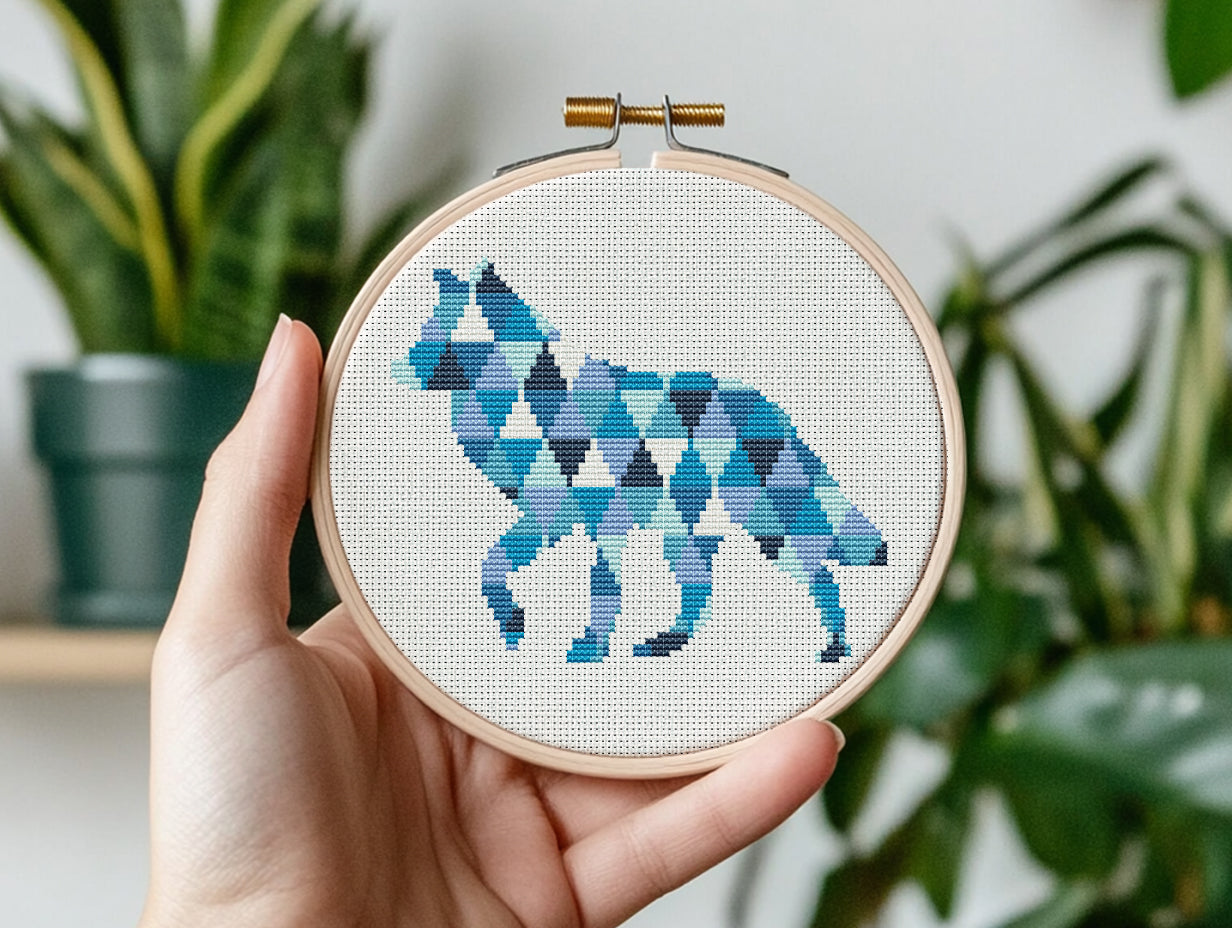 Geometric wolf cross stitch pattern in triangle shapes, modern wildlife PDF embroidery design