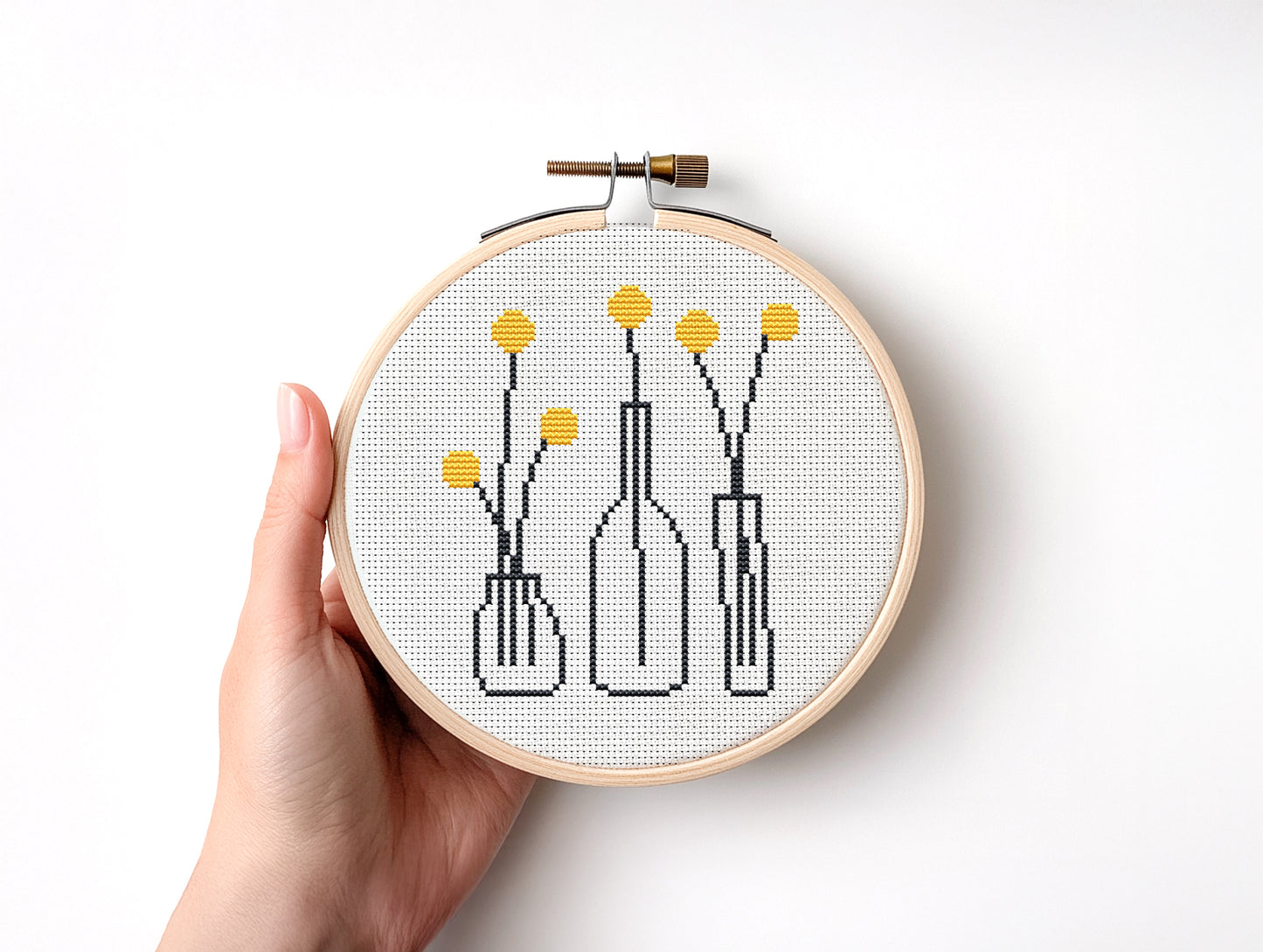 yellow flowers in outline pots cross stitch pattern, minimalist beginner embroidery on white background