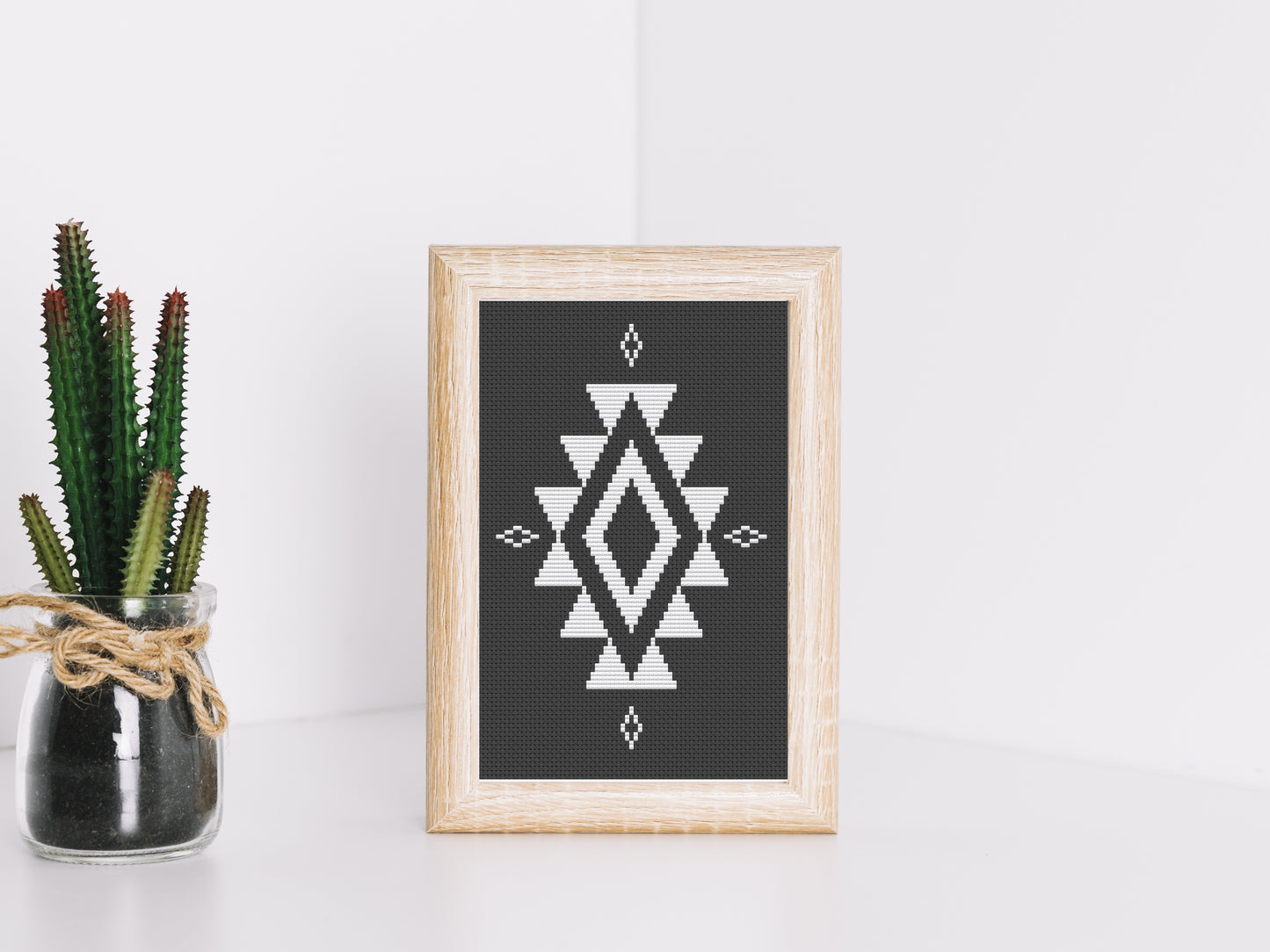 Set of three black and white tribal boho cross stitch patterns with geometric shapes