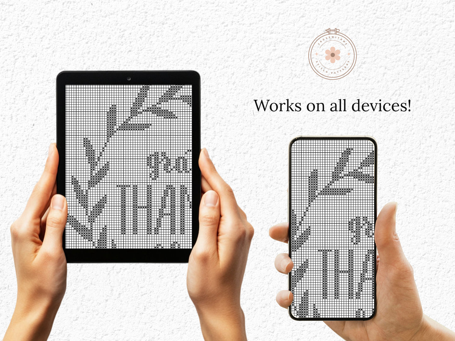 Two devices displaying a cross-stitch pattern with text, held by hands against a light background.