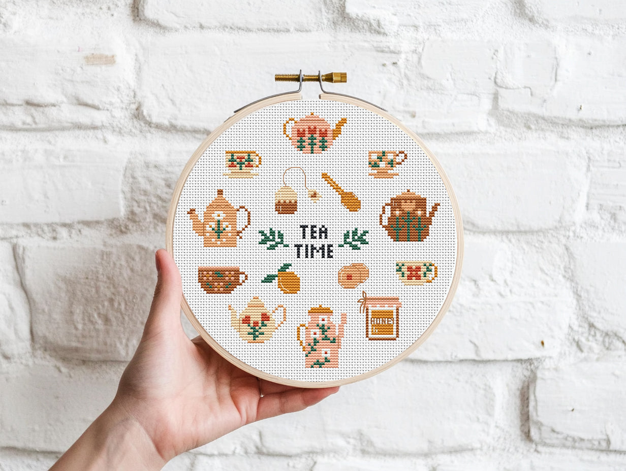 Tea Time cross stitch pattern with teapots, cups, spoons, and sweets in a cozy modern style