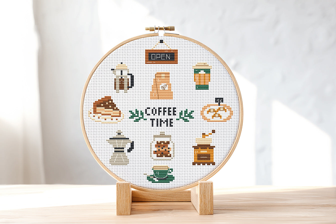 Coffee Time cross stitch pattern with coffee cups, beans, mugs, and cozy coffee-themed elements