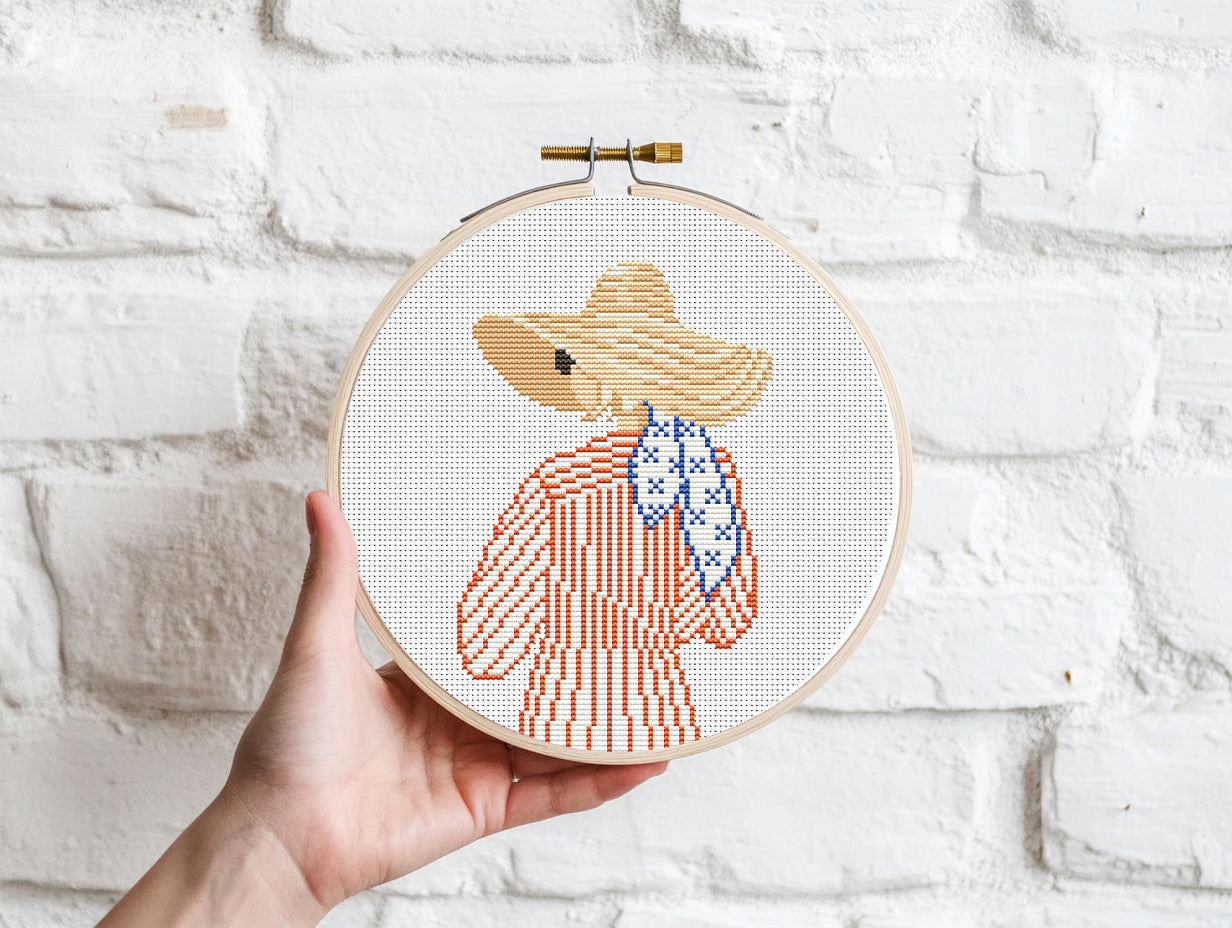 Cross stitch pattern of a woman in a hat looking at the ocean, minimalist summer beach PDF design