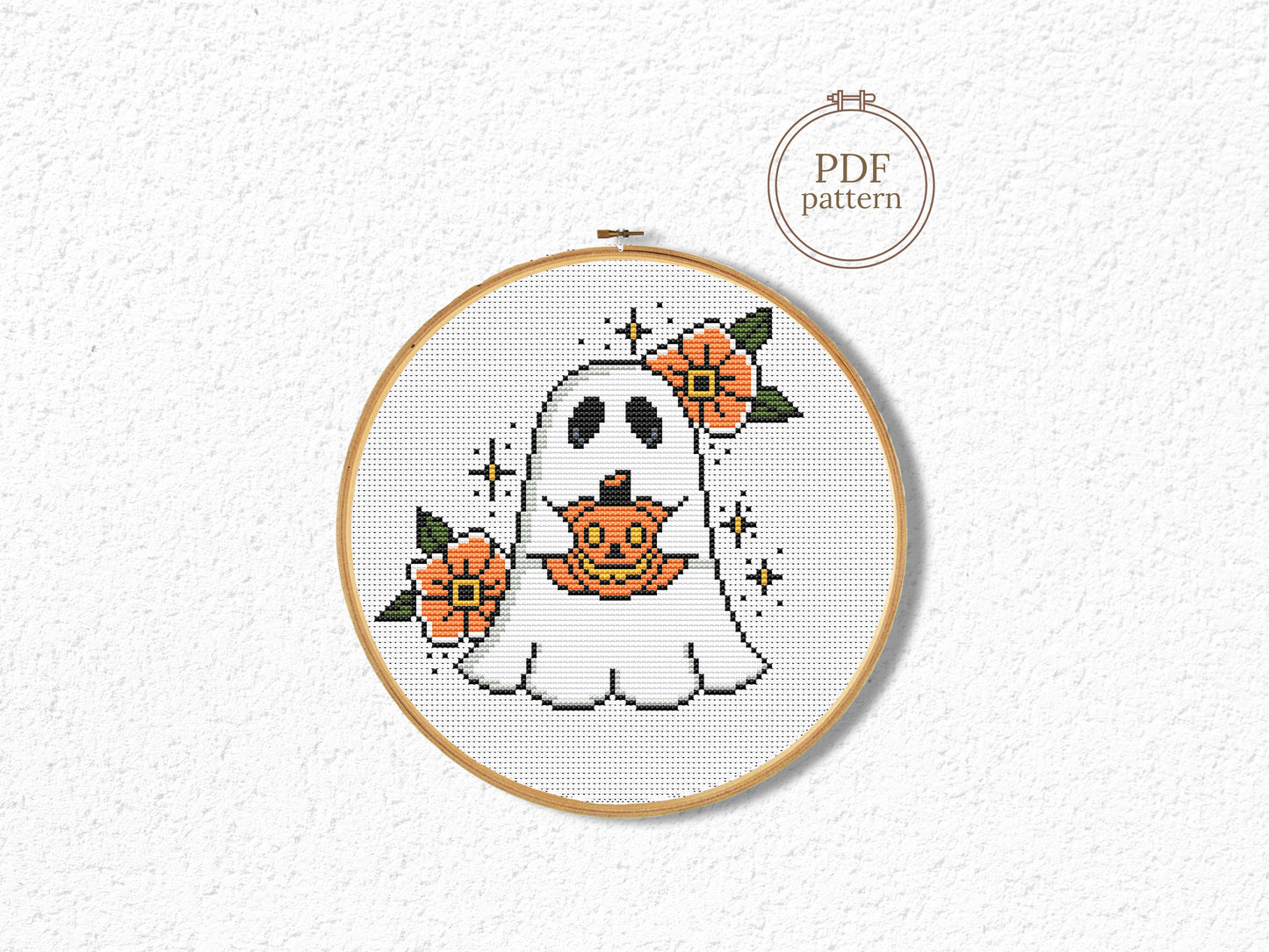 Halloween cross stitch pattern with a spooky ghost design
