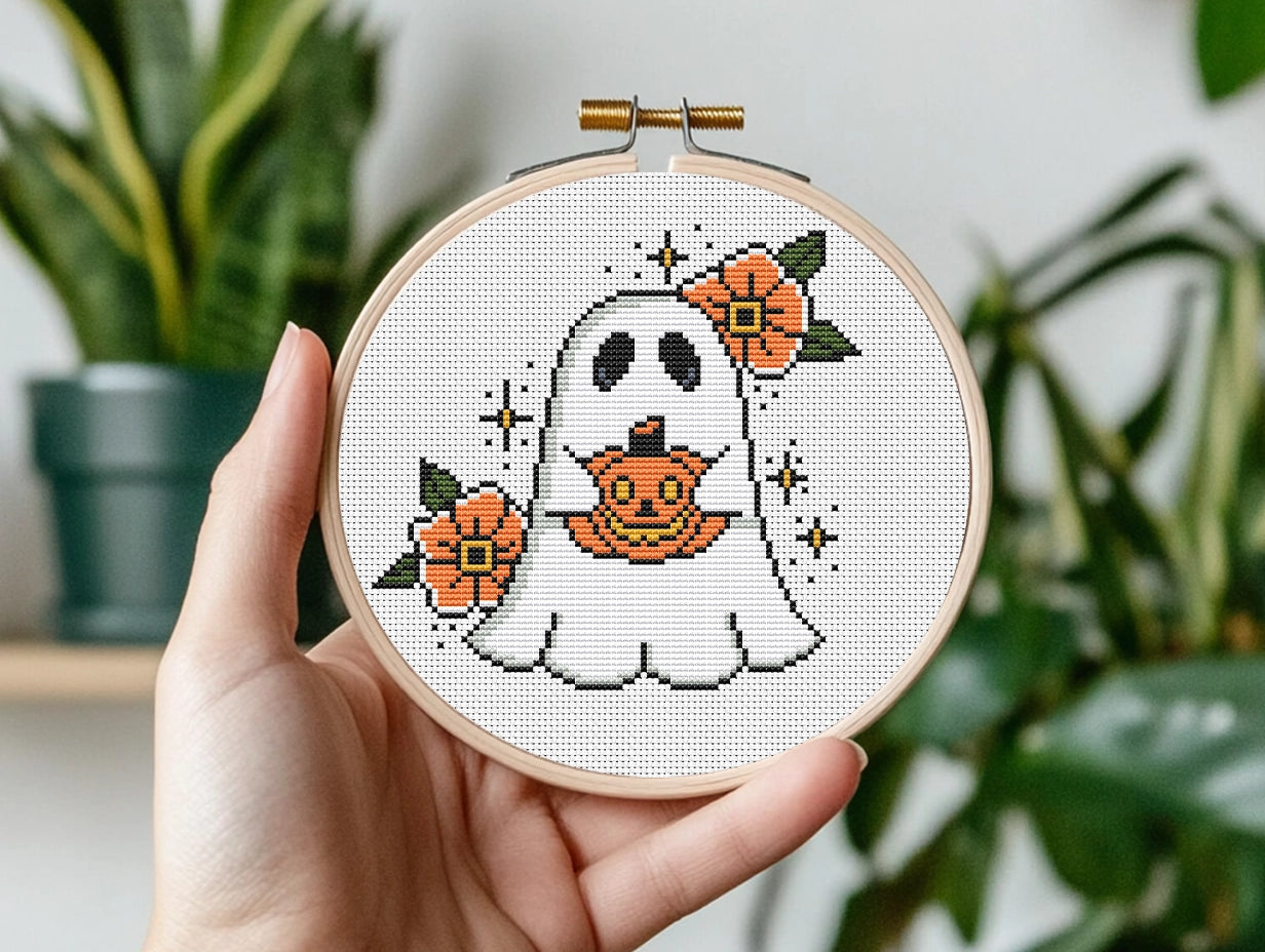 Halloween cross stitch pattern with a spooky ghost design