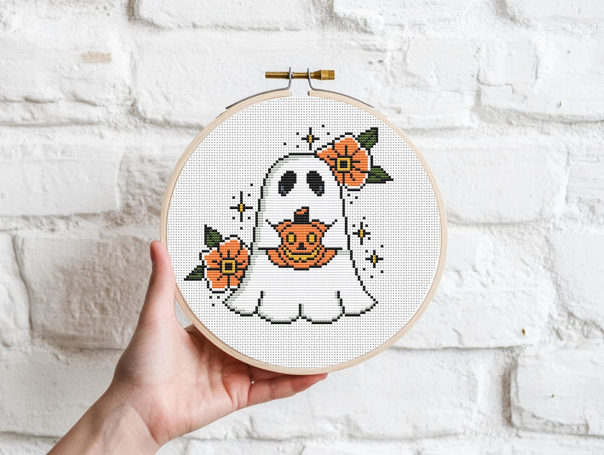 Halloween cross stitch pattern with a spooky ghost design