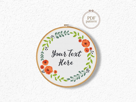Custom cross stitch pattern with red floral wreath and personalized text placeholder - customizable PDF design