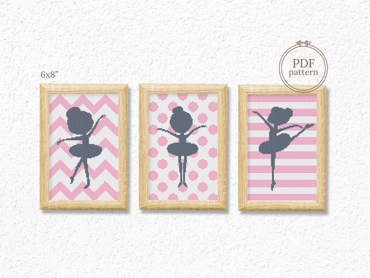 Three framed cross-stitch patterns of a ballerina on pink backgrounds with wooden frames.