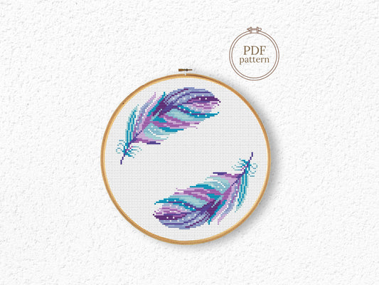 Boho cross stitch pattern with colorful feathers in free-spirited bohemian style