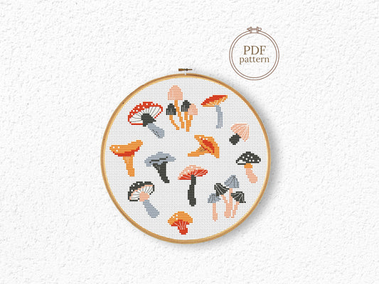 Autumn cross stitch pattern with cozy mushrooms, fall leaves, and seasonal forest elements