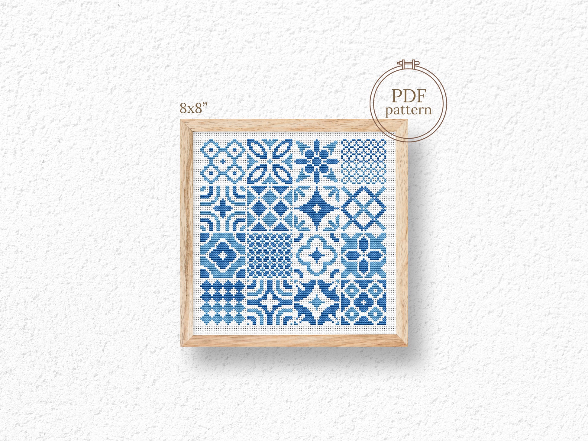 Blue tile style cross stitch pattern with intricate ceramic-inspired design