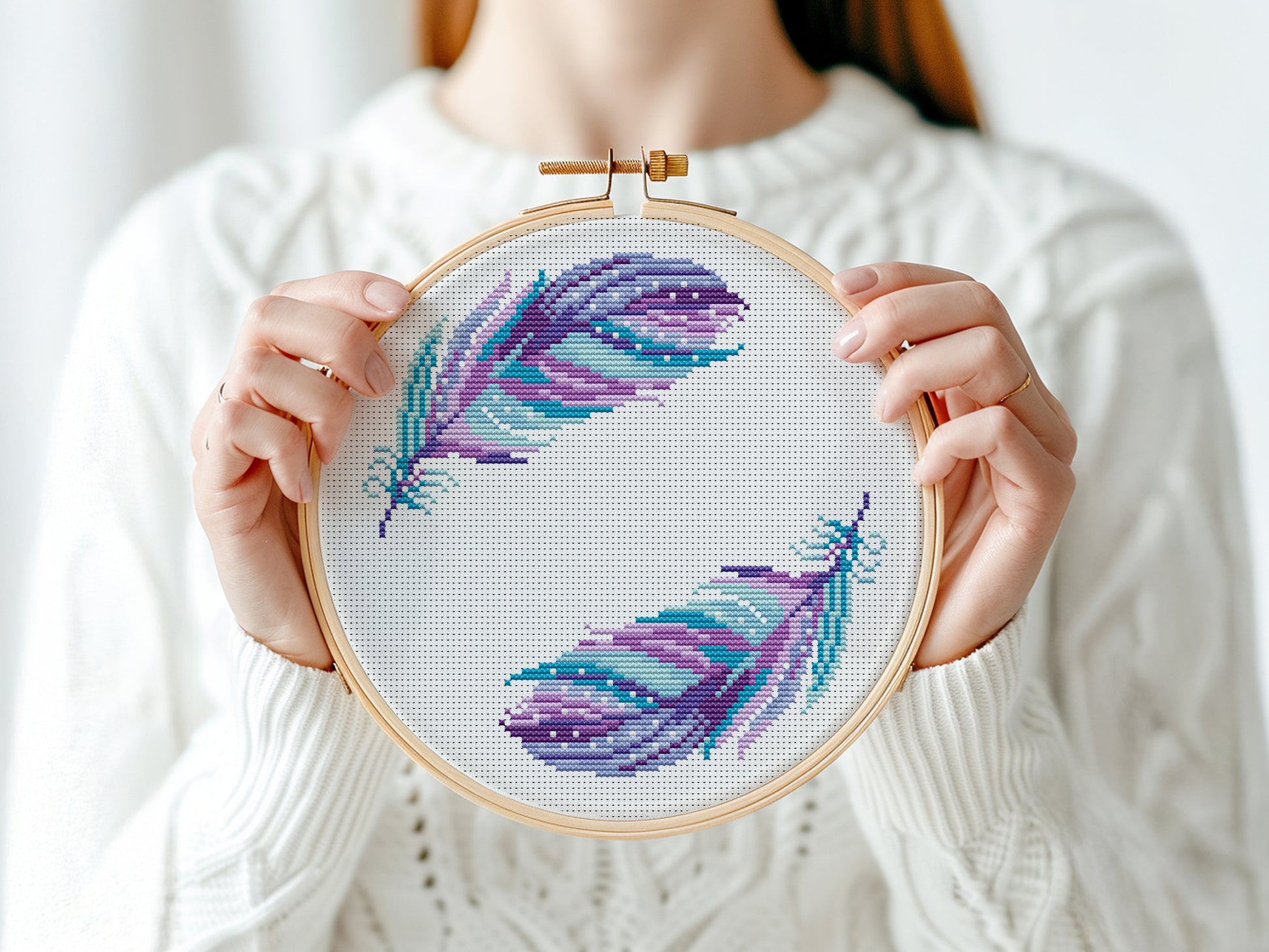 Boho cross stitch pattern with colorful feathers in free-spirited bohemian style
