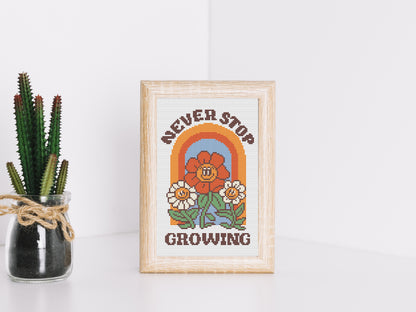 Never Stop Growing cartoon quote cross stitch pattern with retro colors – PDF download.