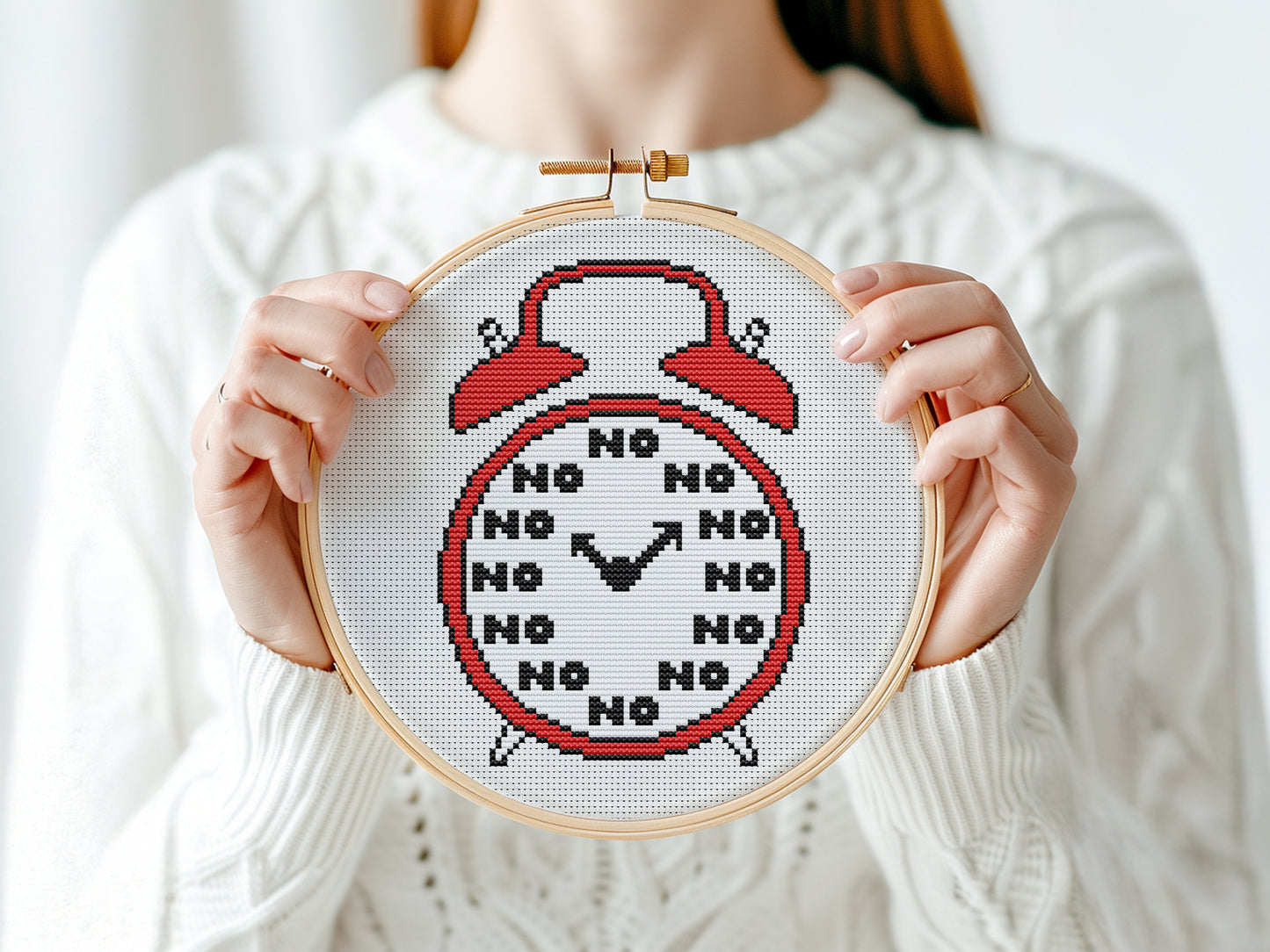 Funny alarm clock cross stitch pattern with playful design