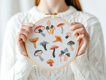 Autumn cross stitch pattern with cozy mushrooms, fall leaves, and seasonal forest elements