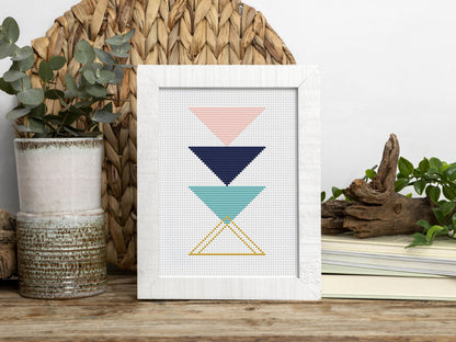 Triangle blue and rose gold abstract cross stitch pattern with modern geometric design
