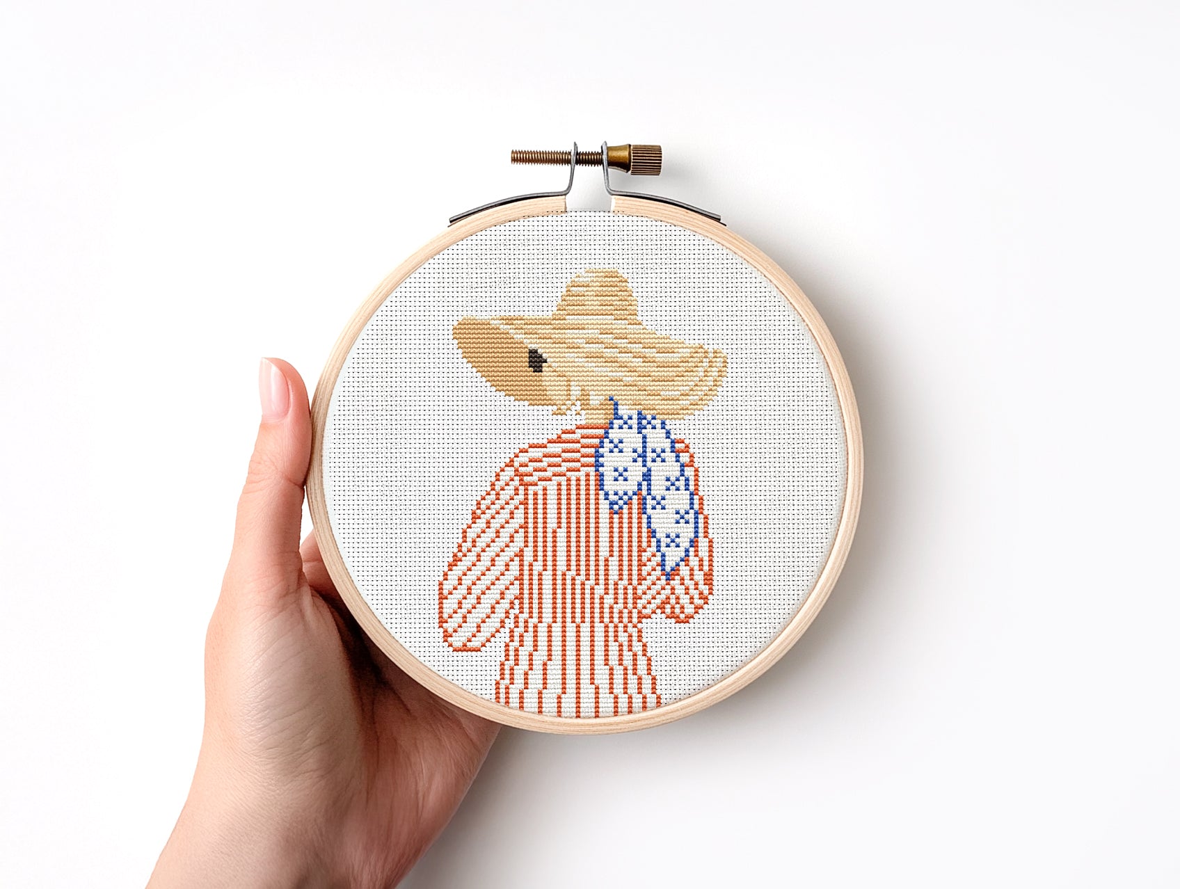 Cross stitch pattern of a woman in a hat looking at the ocean, minimalist summer beach PDF design