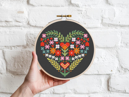 Folk Floral heart cross stitch pattern on black Aida fabric