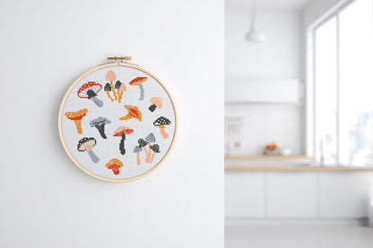 Autumn cross stitch pattern with cozy mushrooms, fall leaves, and seasonal forest elements