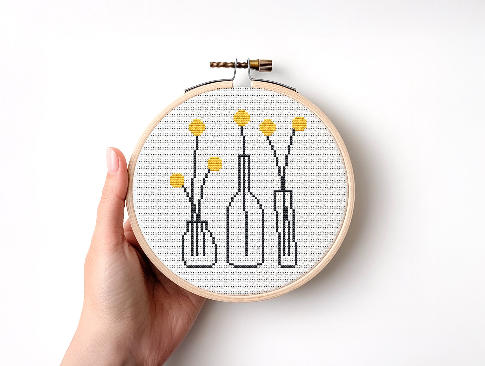 yellow flowers in outline pots cross stitch pattern, minimalist beginner embroidery on white background
